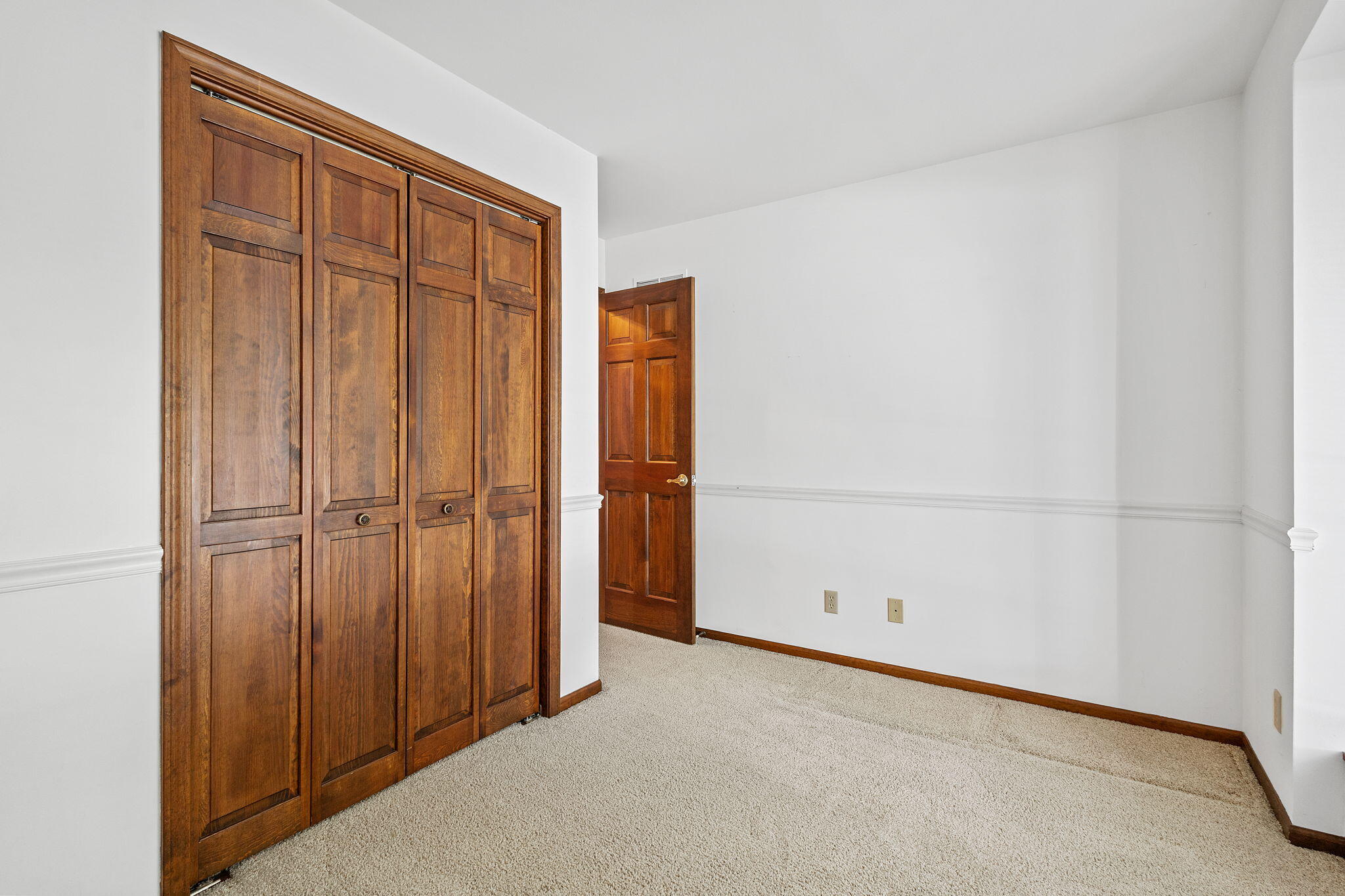 1905 Juniper Street Southwest De Motte, IN 46310 - Photo 27 of 42 an empty room with a wooden door