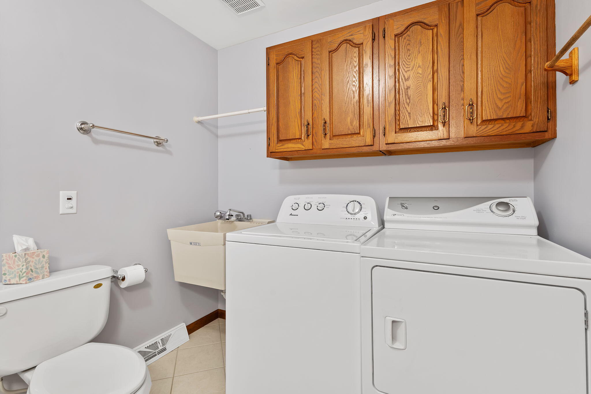 1905 Juniper Street Southwest De Motte, IN 46310 - Photo 32 of 42 a utility room with dryer and washer