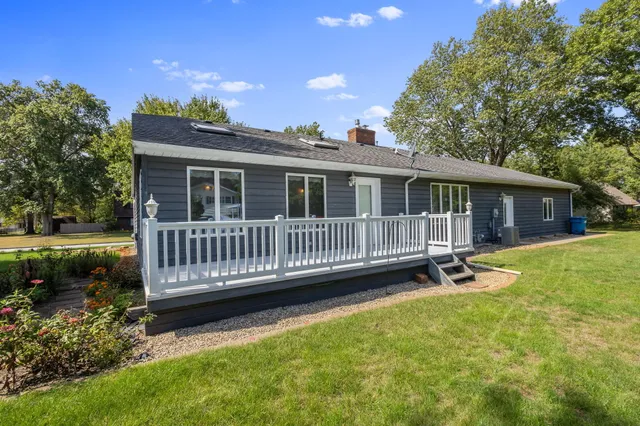 a view of backyard with large tree