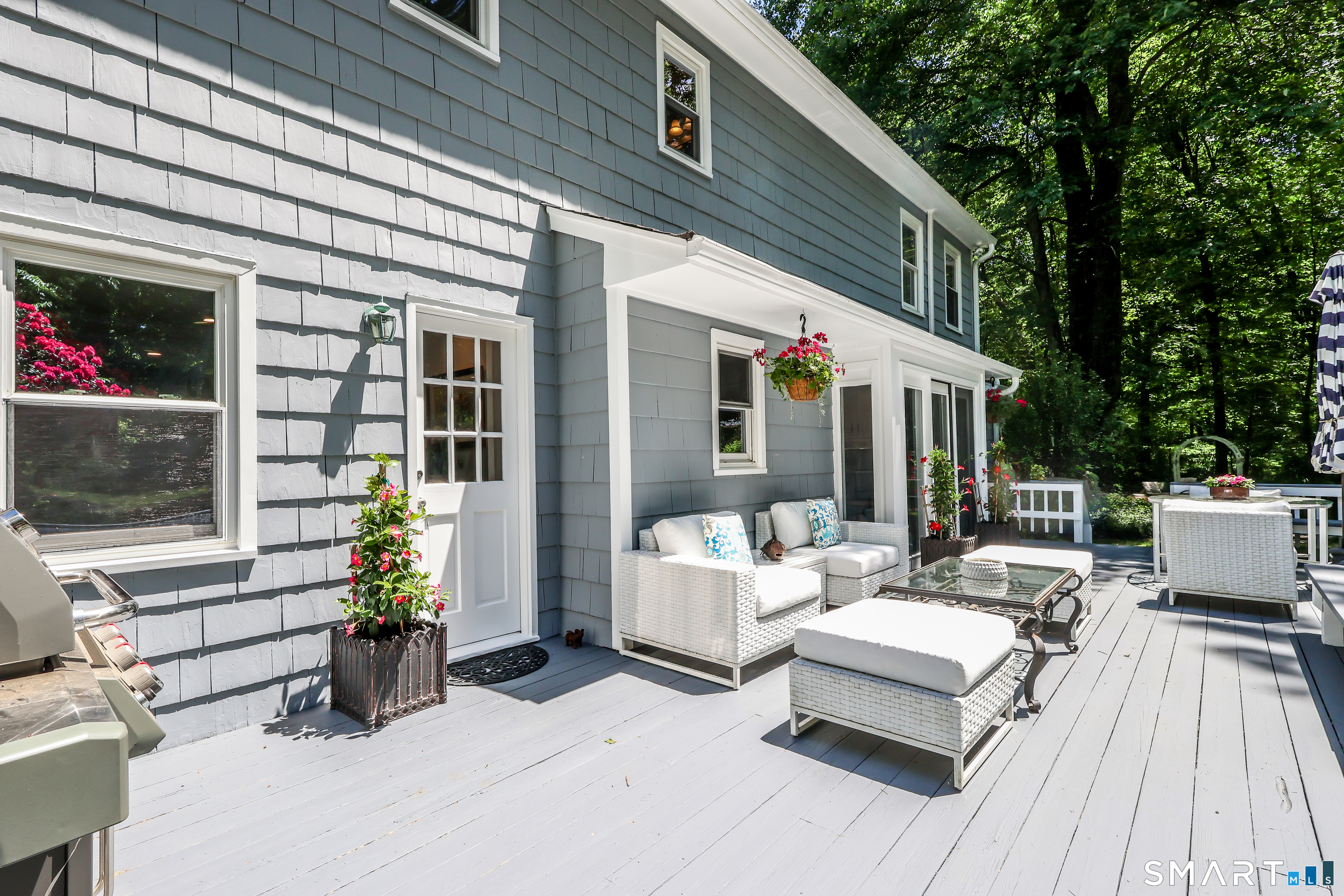 23 Old Green Road Newtown, CT 06482 - Photo 13 of 36 a view of a patio with couches table and chairs and potted plants