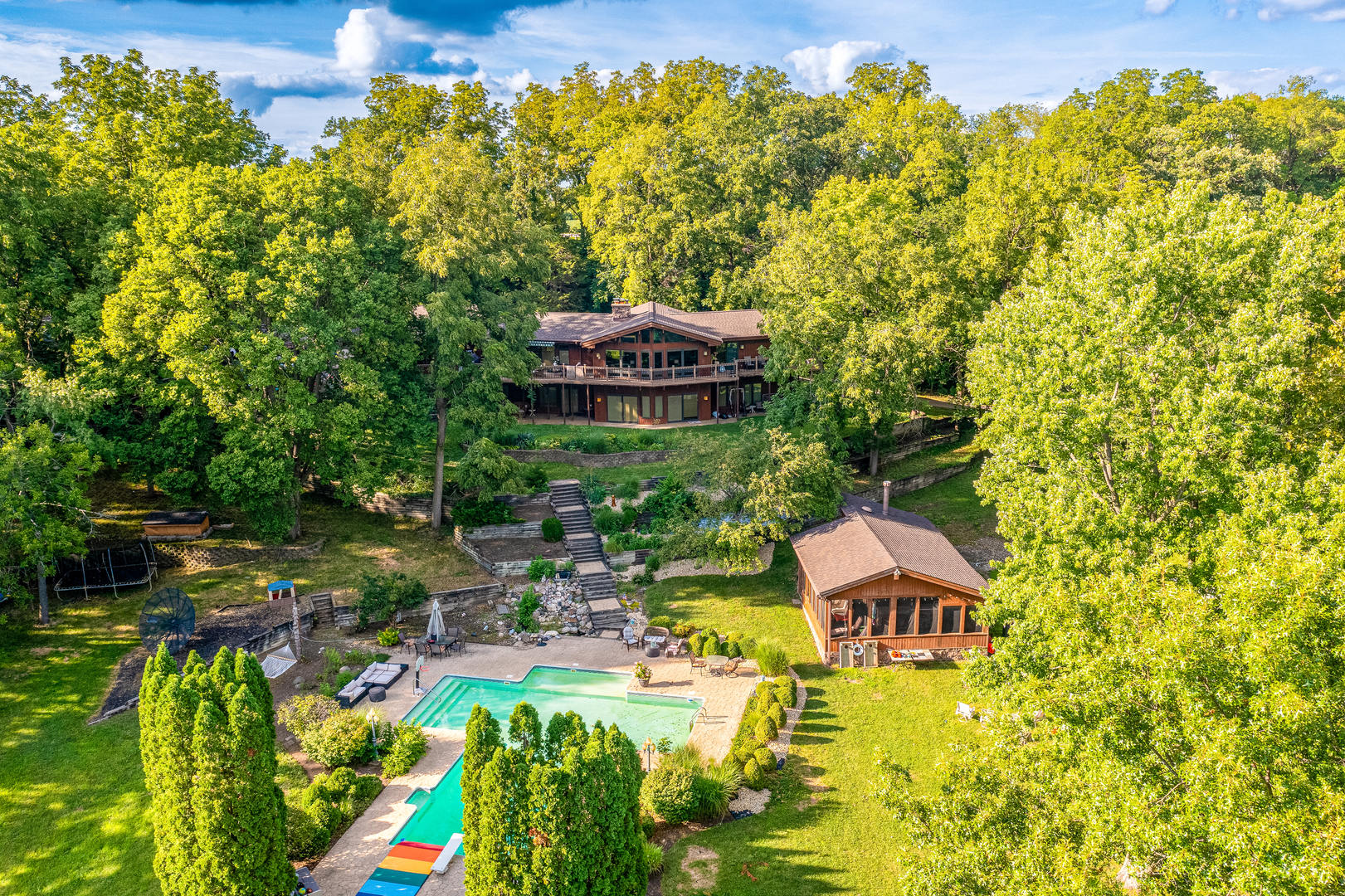 12300 River Road Plano, IL 60545 - Photo 23 of 25 a view of a large yard with plants and large trees