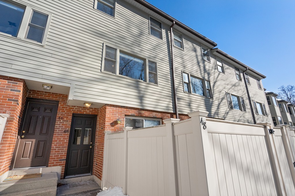 48 Regent Circle, Unit 48 Brookline, MA 02445 - Photo 1 of 14 a view of a house with a door