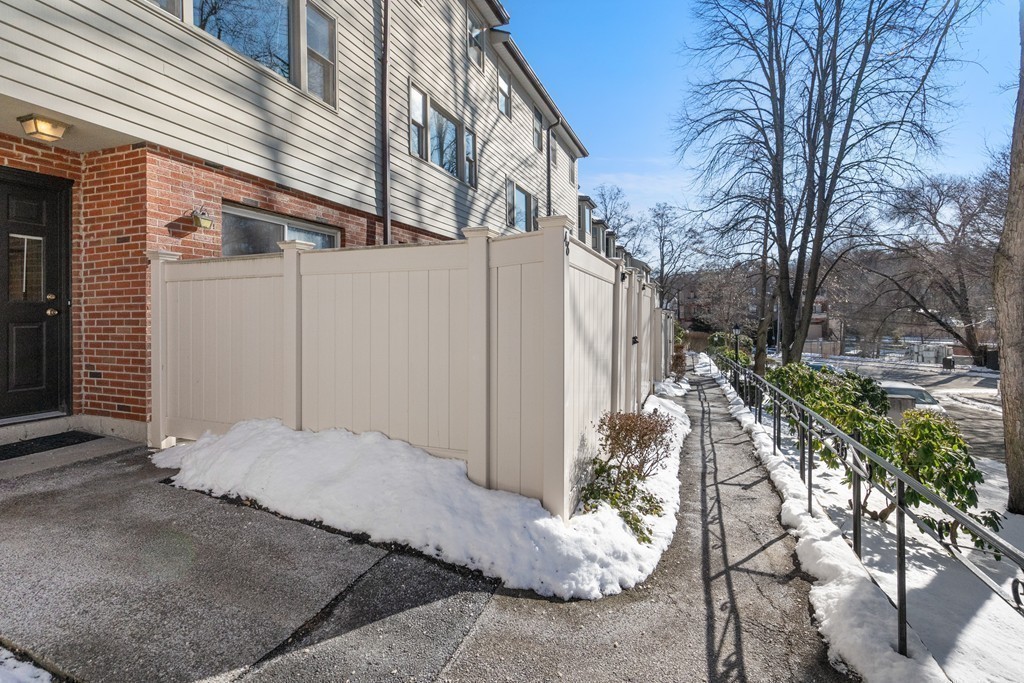 48 Regent Circle, Unit 48 Brookline, MA 02445 - Photo 11 of 14 a view of a back yard of the house
