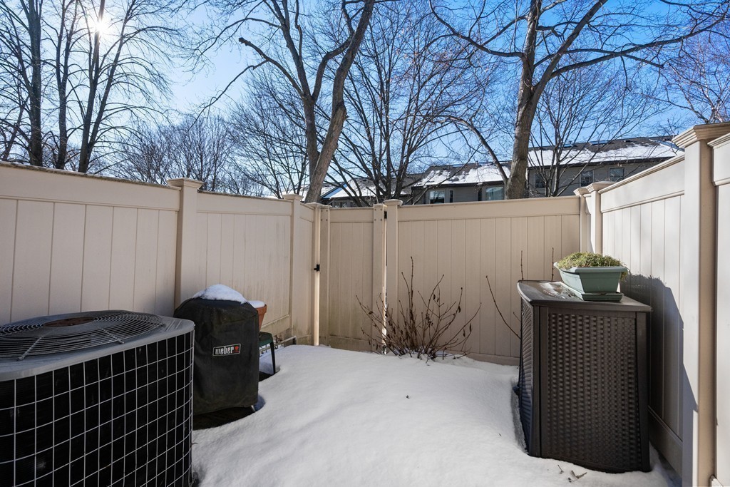 48 Regent Circle, Unit 48 Brookline, MA 02445 - Photo 14 of 14 a view of backyard with seating space and trees