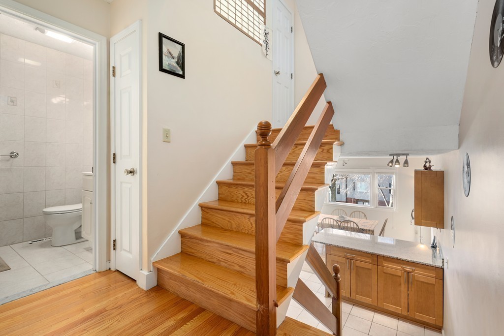 48 Regent Circle, Unit 48 Brookline, MA 02445 - Photo 5 of 14 a view of entryway and hall with wooden floor