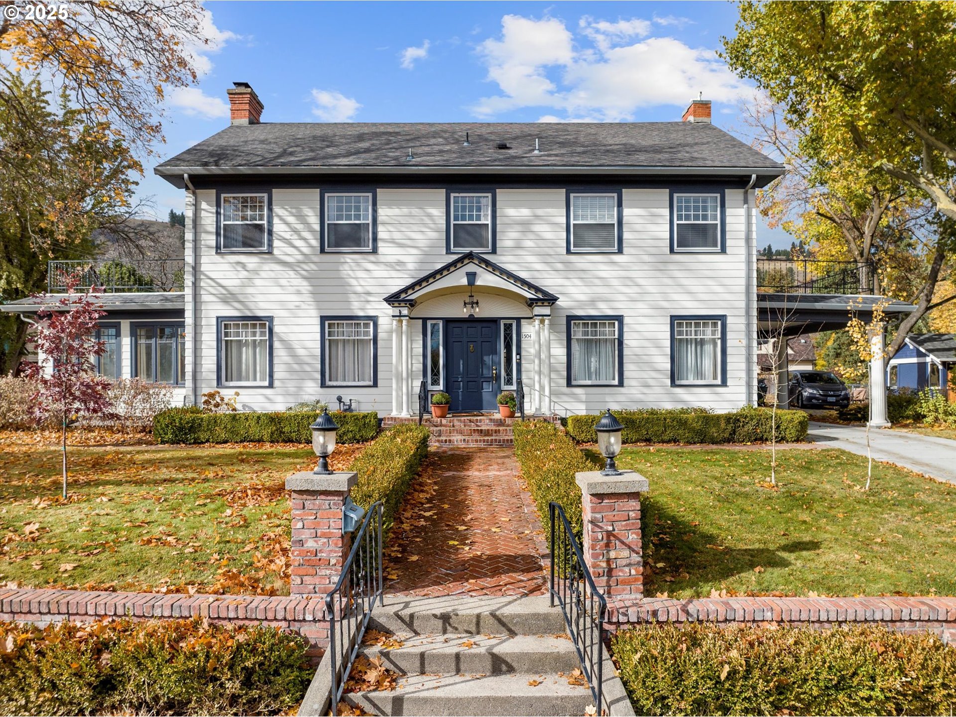 a front view of a house with a yard
