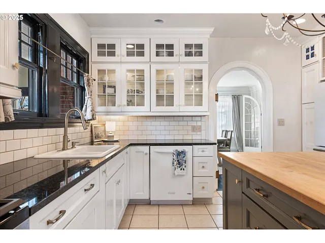 a view of a kitchen with a sink