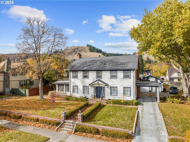 a front view of a house with swimming pool