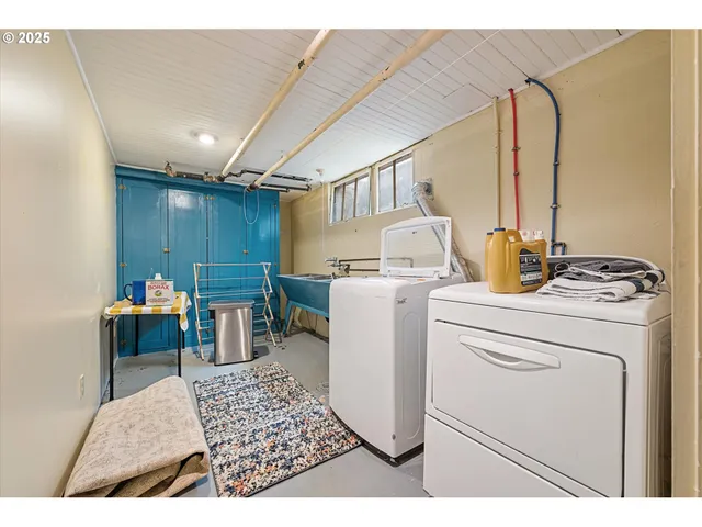 a storage room with washer and dryer