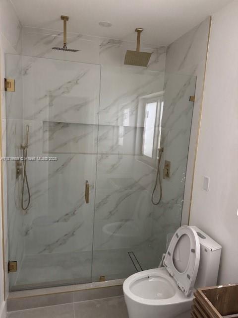 905 Tangier Street Coral Gables, FL 33134 - Photo 6 of 7 a bathroom with a toilet and shower