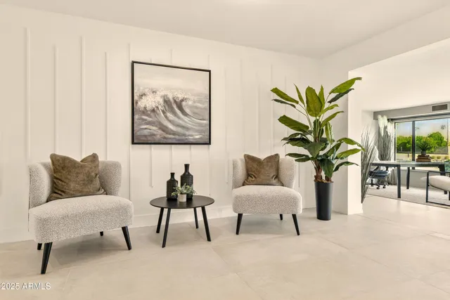 a view of kitchen with furniture and a potted plant