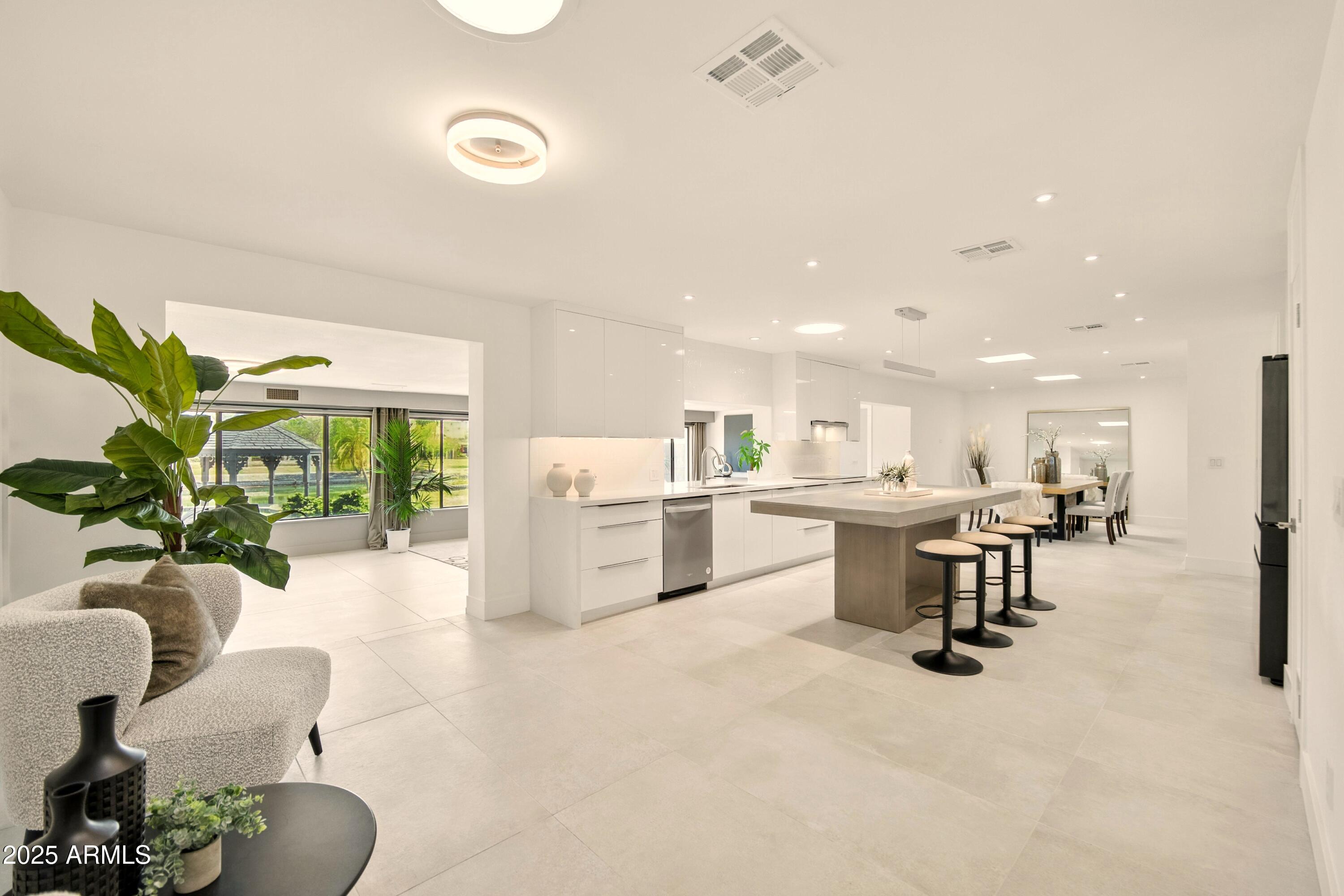 2425 West Impala Circle Mesa, AZ 85202 - Photo 14 of 55 a view of kitchen with furniture and a potted plant