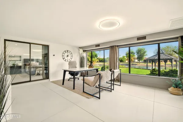 a view of a livingroom with furniture and windows