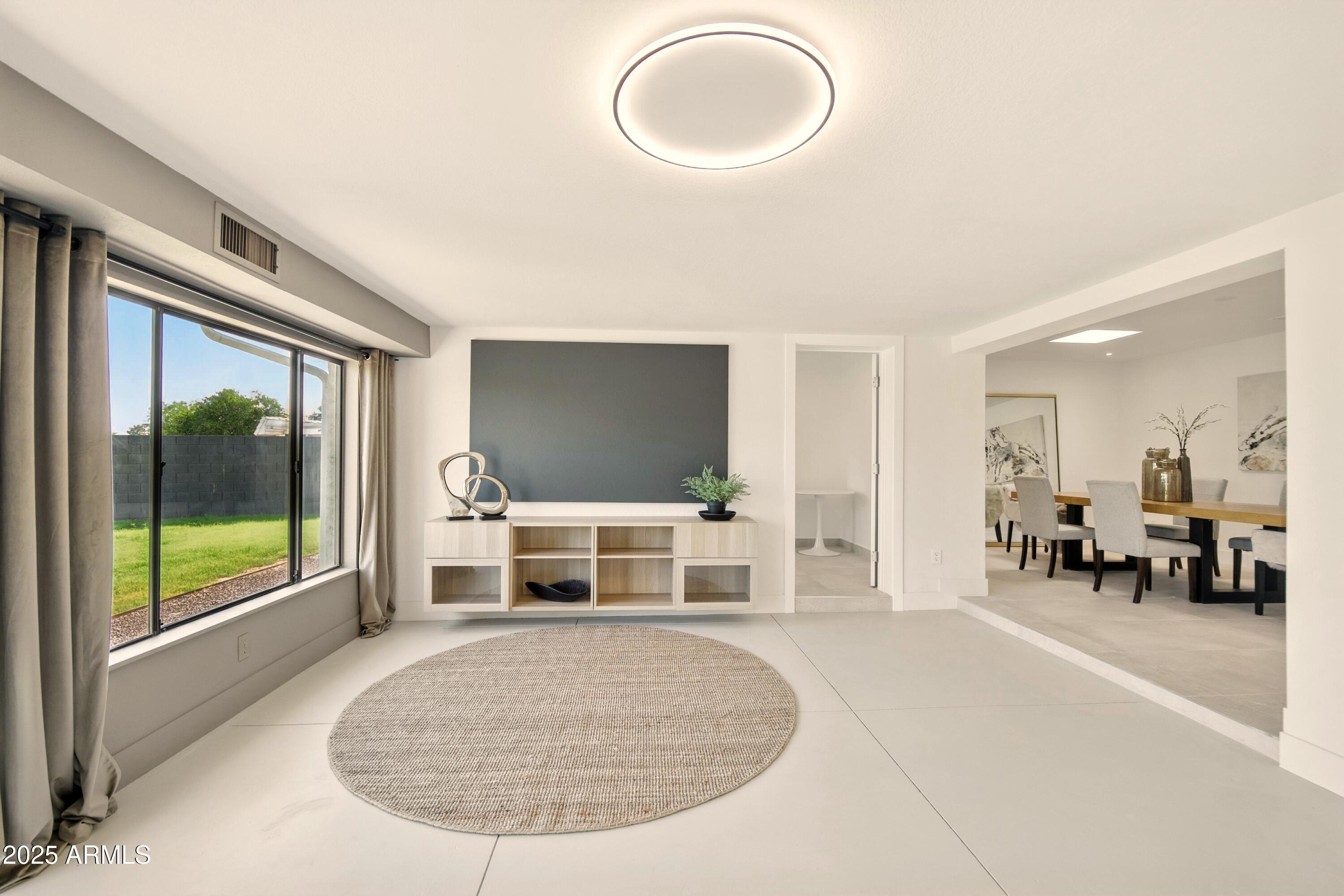 2425 West Impala Circle Mesa, AZ 85202 - Photo 27 of 55 a view of a livingroom with furniture and windows