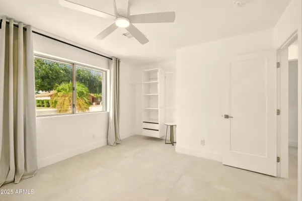 a view of livingroom with furniture and windows