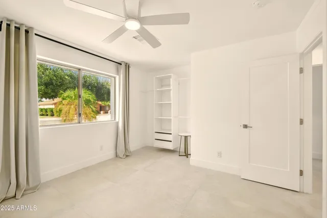 a view of livingroom with furniture and windows