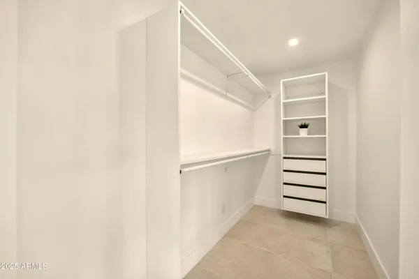a bathroom with a double vanity sink mirror and