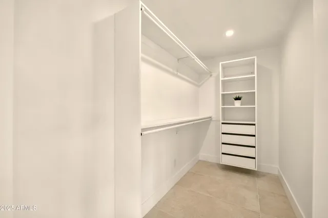 a bathroom with a double vanity sink mirror and