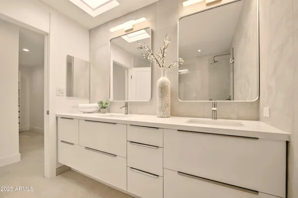 a view of a lake with a house in the background