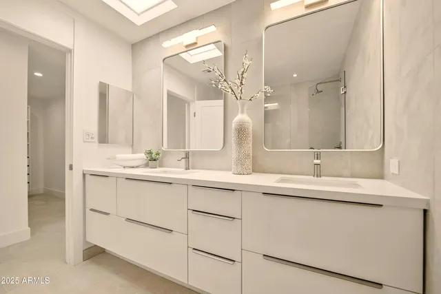 a view of a lake with a house in the background