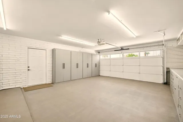 a front view of a house with a lake view