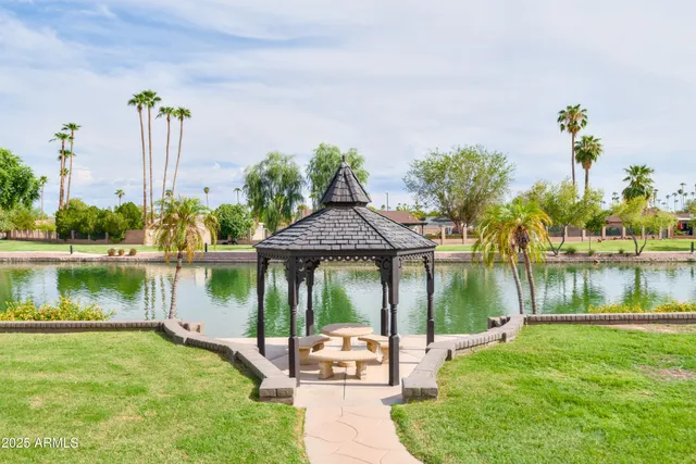 a view of a garden with houses