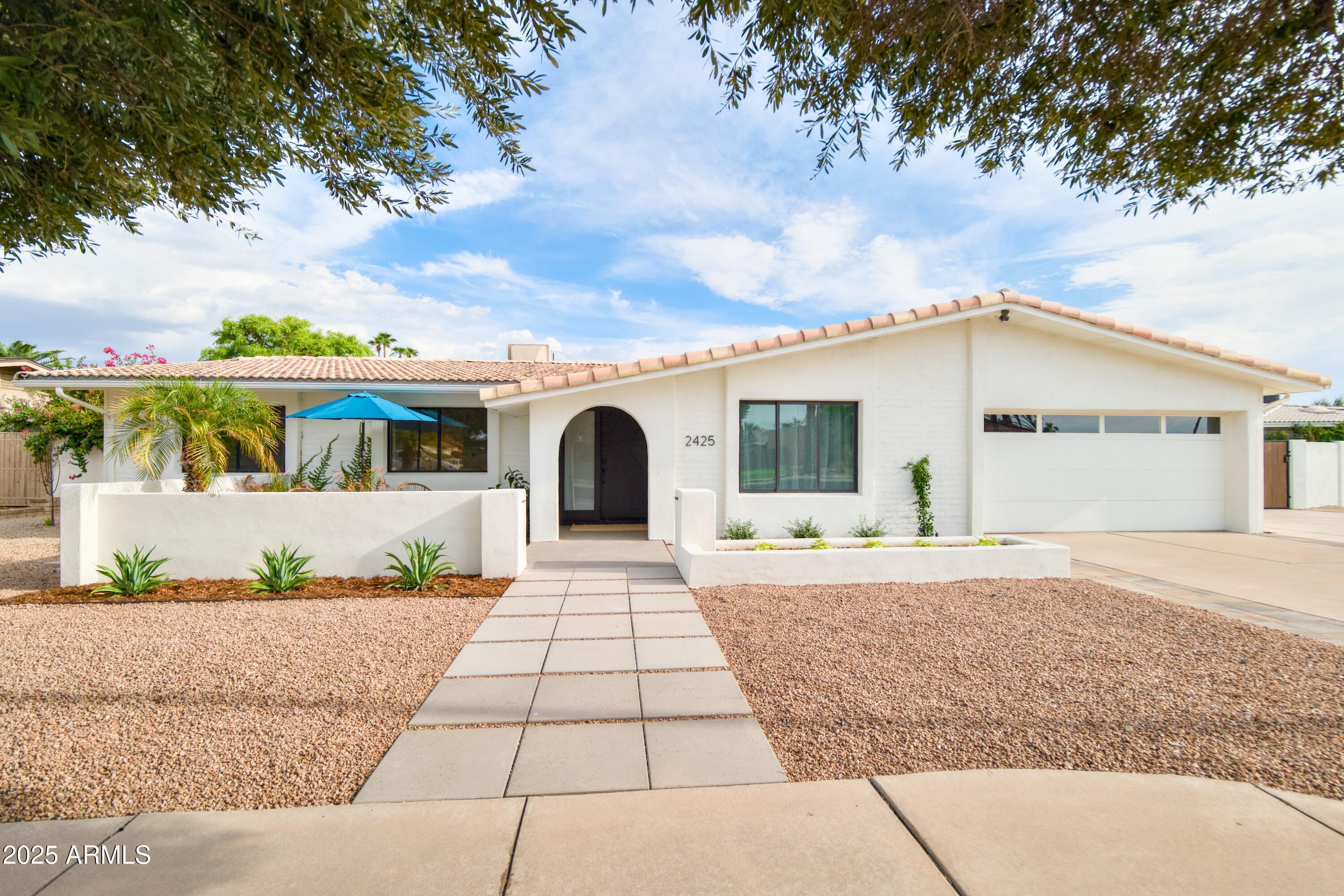 2425 West Impala Circle Mesa, AZ 85202 - Photo 5 of 55 front view of house with a yard