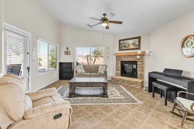 a dining room with furniture and window