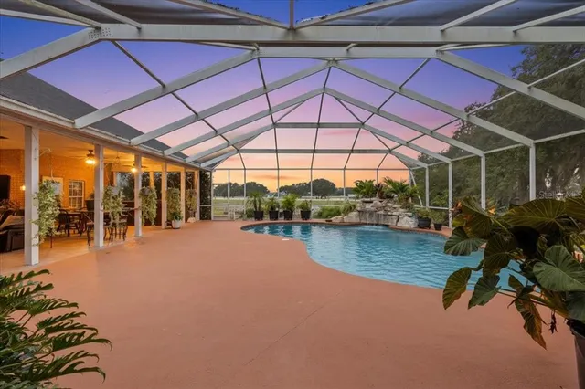 a kitchen with stainless steel appliances a refrigerator and a stove