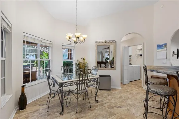 a bedroom with a bed and a dresser in it