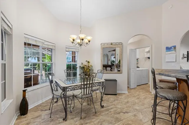 a bedroom with a bed and a dresser in it