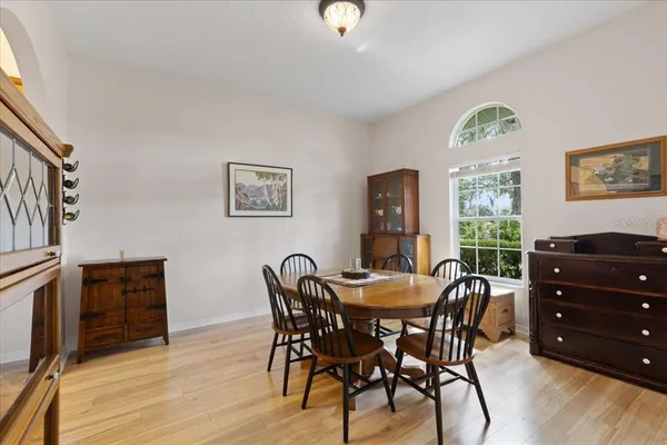 a bathroom with a double vanity sink mirror and shower