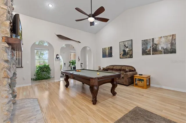 a view of kitchen with furniture wooden floor and window
