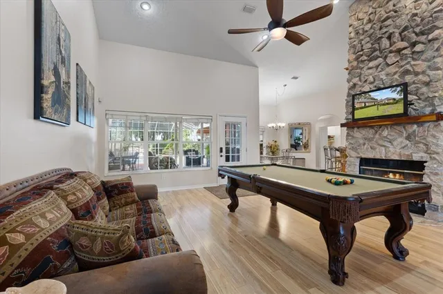 a living room with furniture and a window