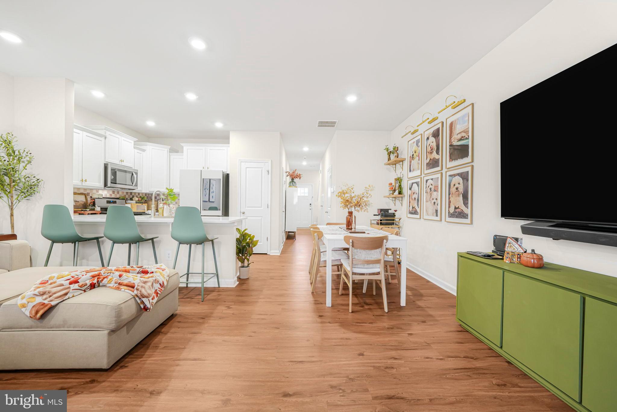 69 Peregrine Way Burlington, NJ 08016 - Photo 11 of 28 a living room with furniture and a flat screen tv