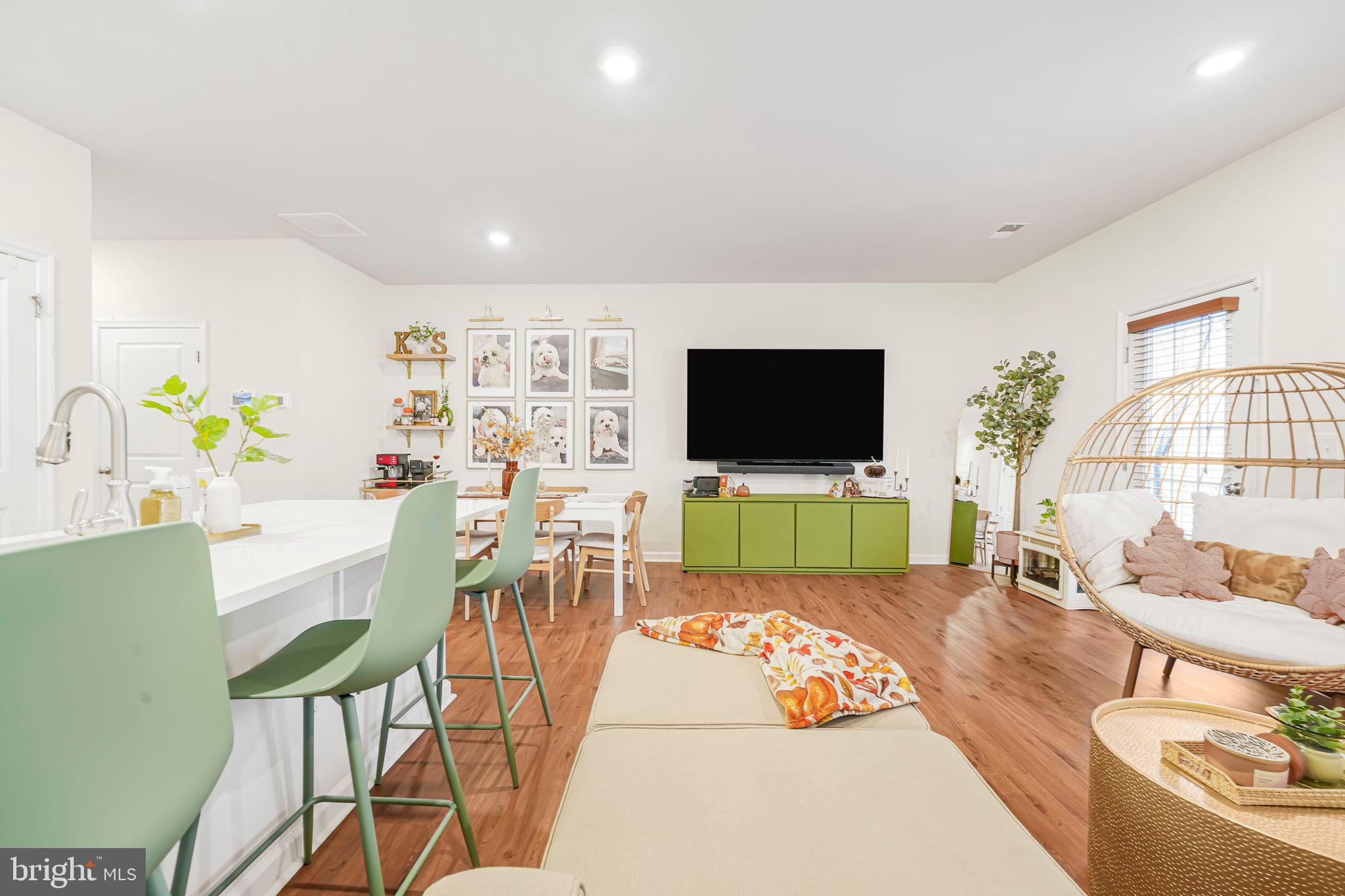 69 Peregrine Way Burlington, NJ 08016 - Photo 12 of 28 a living room with furniture and a flat screen tv