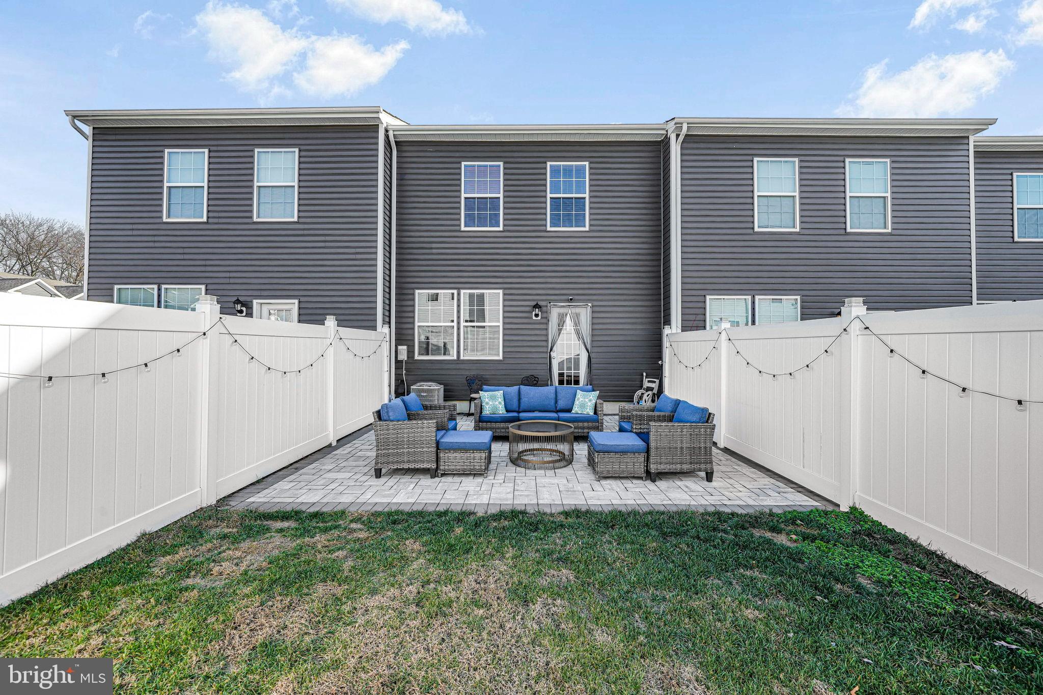 69 Peregrine Way Burlington, NJ 08016 - Photo 14 of 28 a view of a house with backyard and a patio