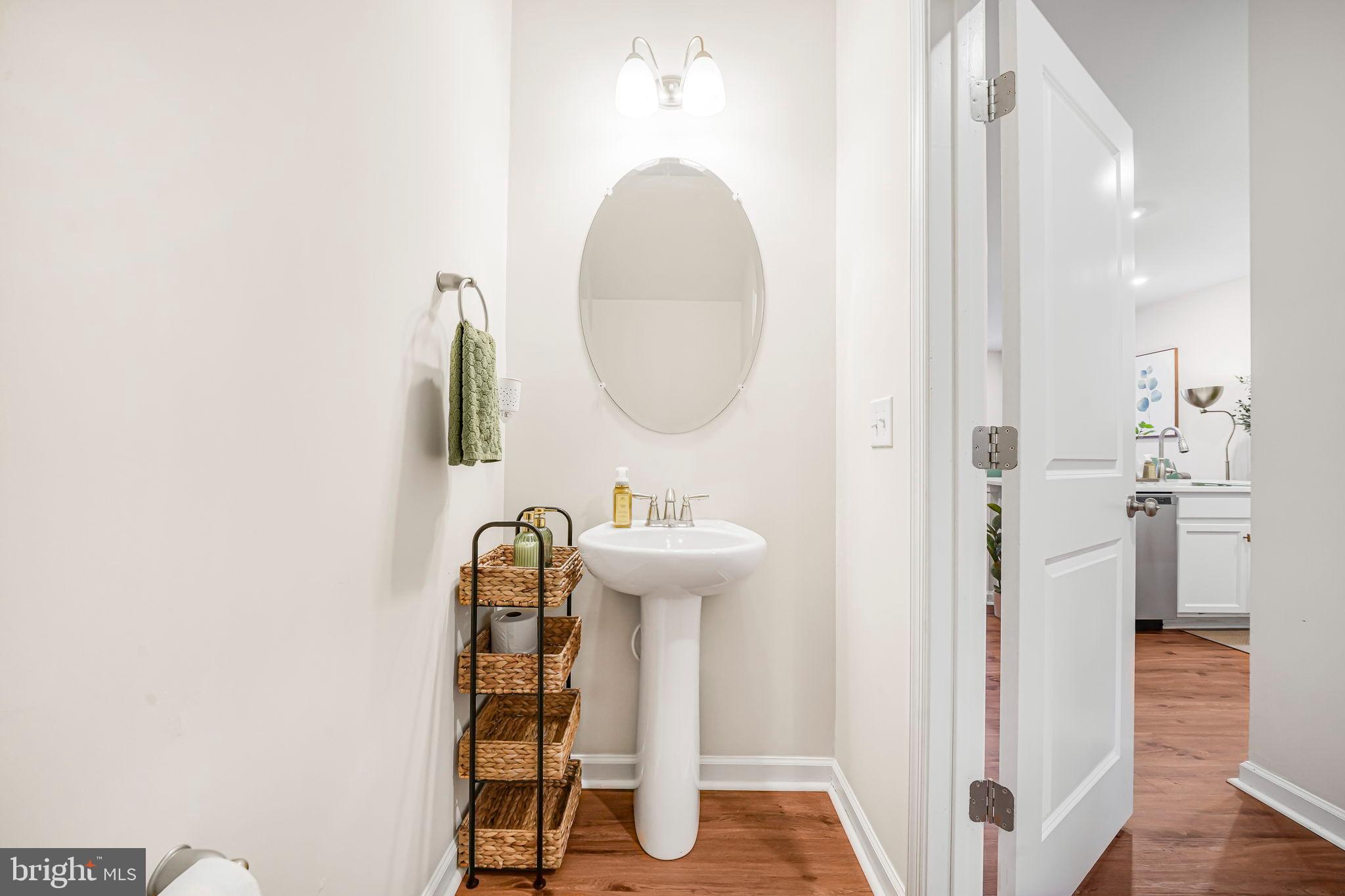 69 Peregrine Way Burlington, NJ 08016 - Photo 16 of 28 a bathroom with a sink and a mirror