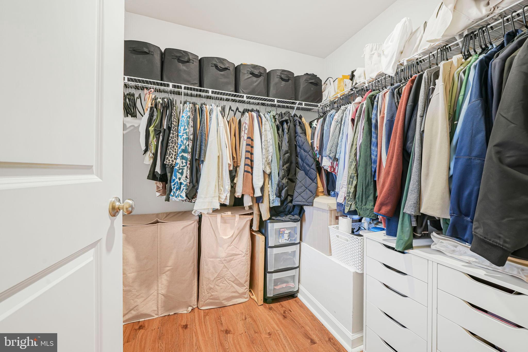 69 Peregrine Way Burlington, NJ 08016 - Photo 21 of 28 a view of walk in closet with clothes and shoes