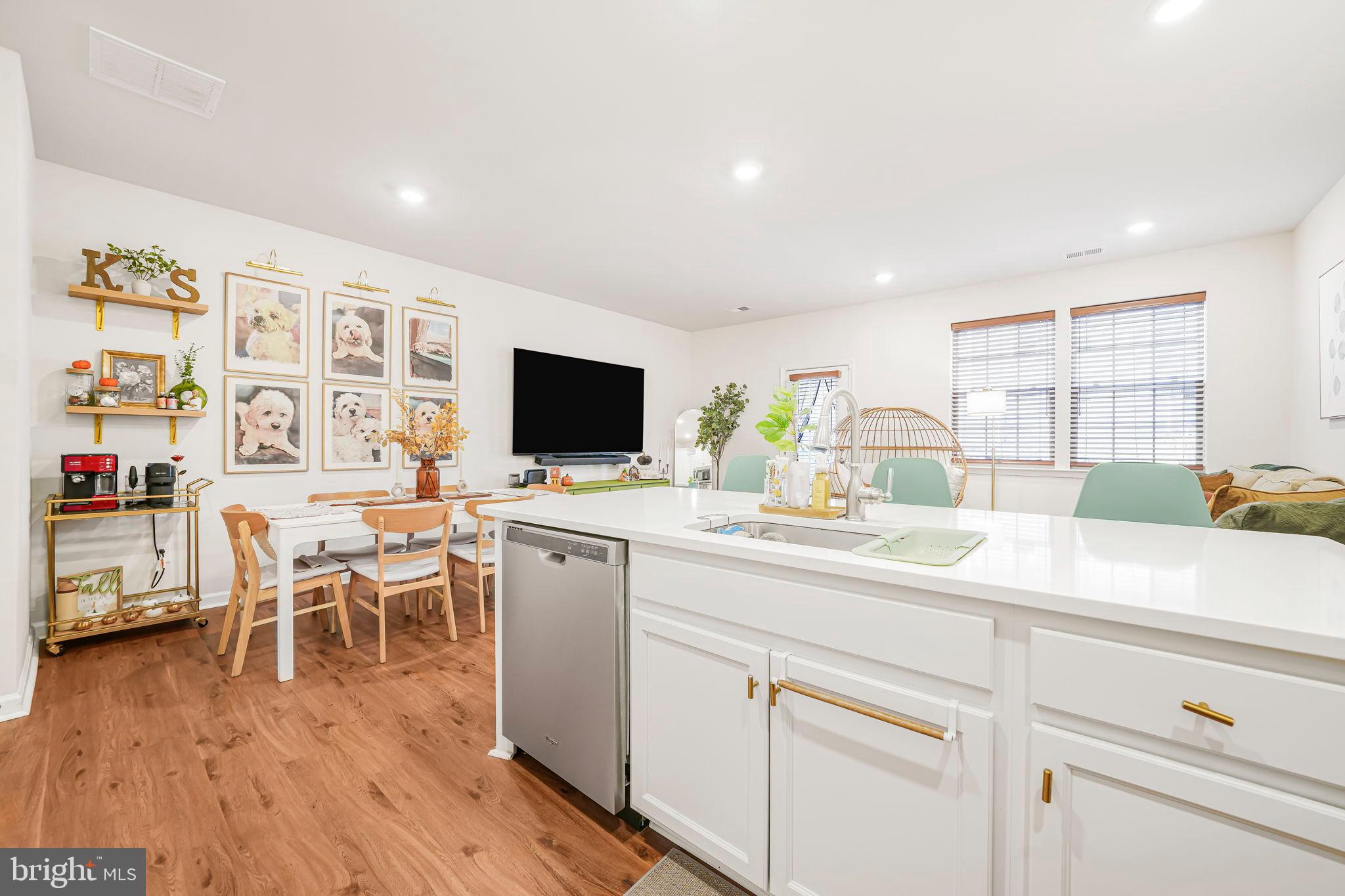 69 Peregrine Way Burlington, NJ 08016 - Photo 6 of 28 a kitchen with a sink cabinets and wooden floor