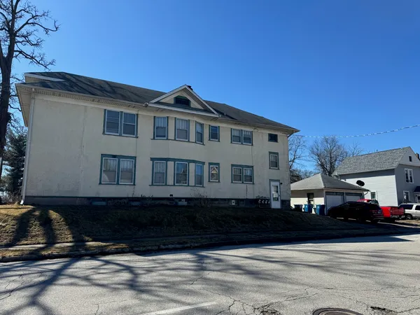 a car parked in front of a house