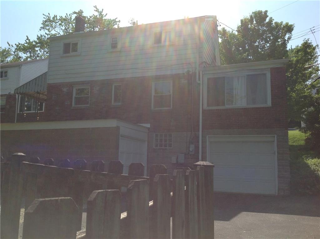 928 Braddock Road Pittsburgh, PA 15221 - Photo 22 of 24 Rear view of the house with 2 garages.