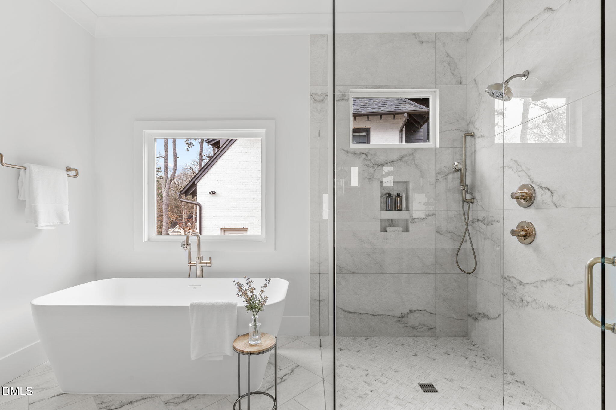 415 Webster Street Cary, NC 27511 - Photo 14 of 19 a bathroom with a shower a sink and a mirror