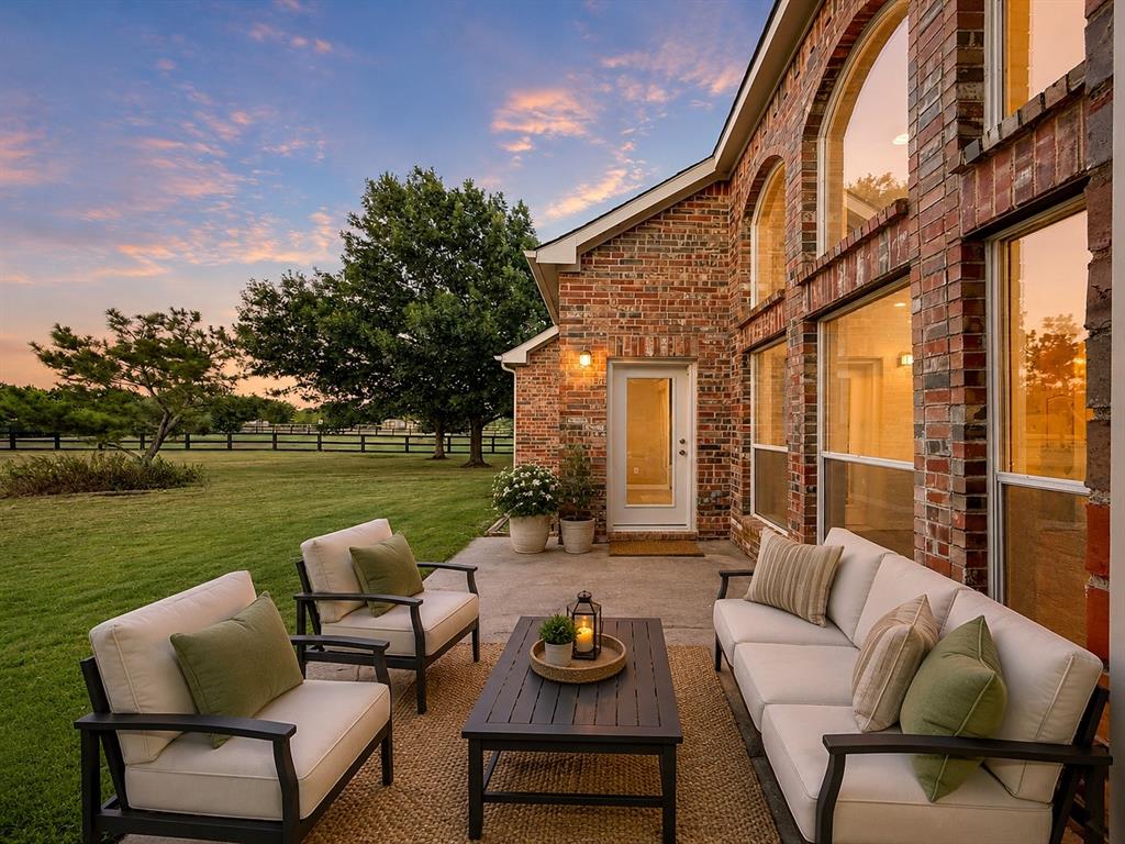 7517 Rodeo Drive Denton, TX 76208 - Photo 35 of 39 Back Patio - virtually staged to show potential