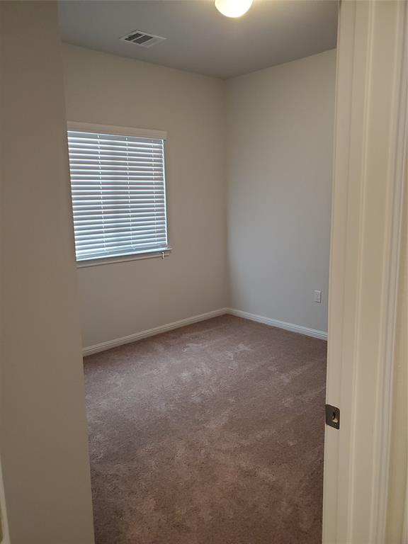 6404 Gunflint Drive Austin, TX 78747 - Photo 9 of 21 A well-lit room offers a clean canvas for your personal touches.