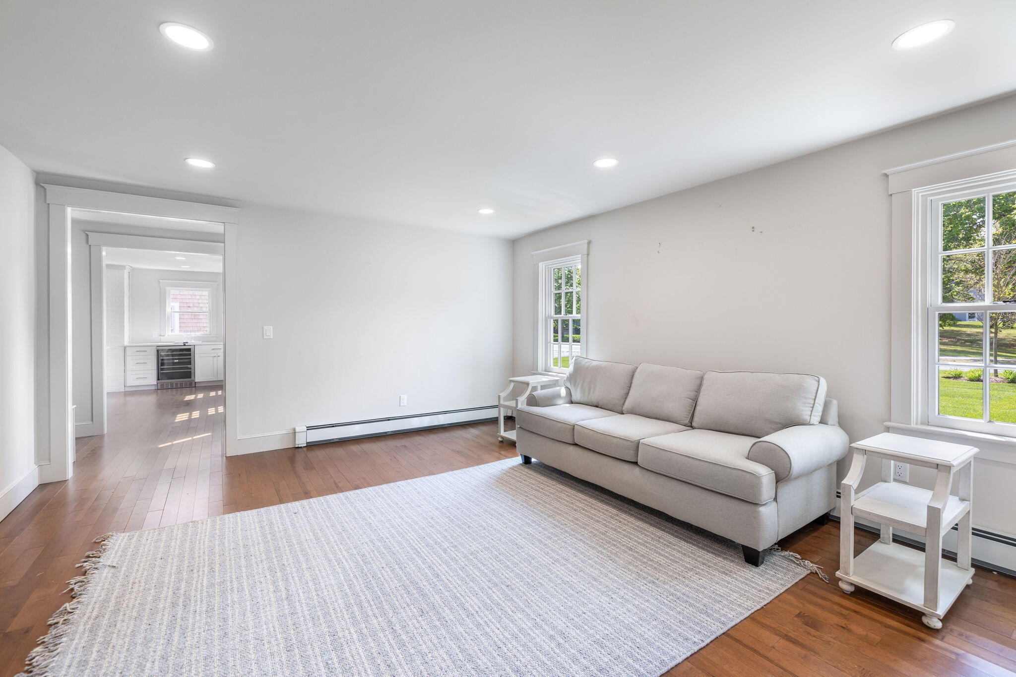 1180 Main Street Cotuit, MA 02635 - Photo 16 of 82 a living room with furniture and a wooden floor