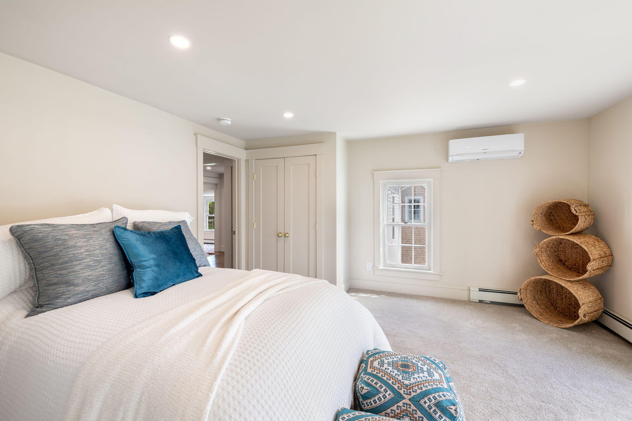 1180 Main Street Cotuit, MA 02635 - Photo 23 of 82 a bedroom with a bed and window