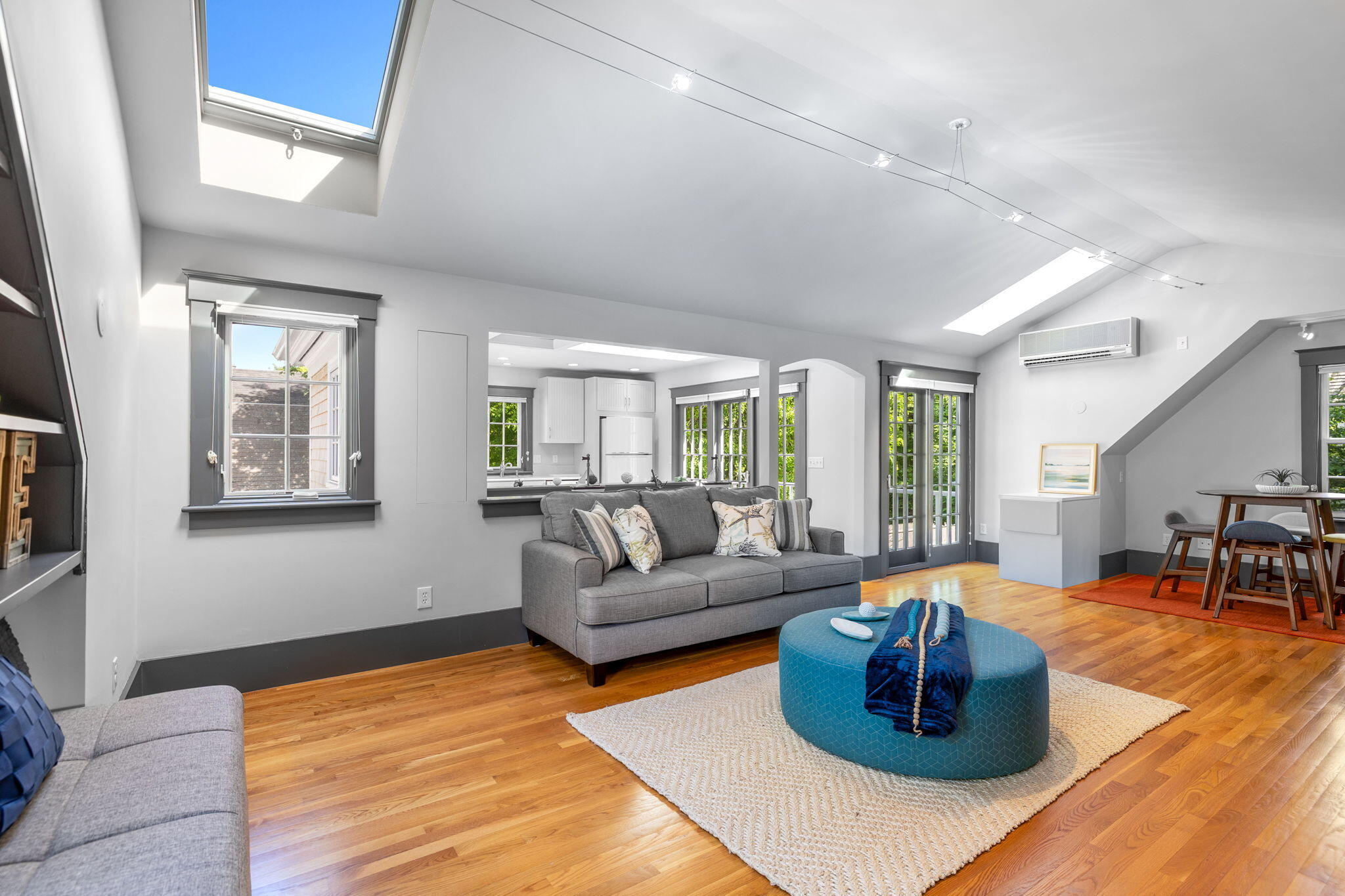 1180 Main Street Cotuit, MA 02635 - Photo 38 of 82 a living room with furniture and a large window