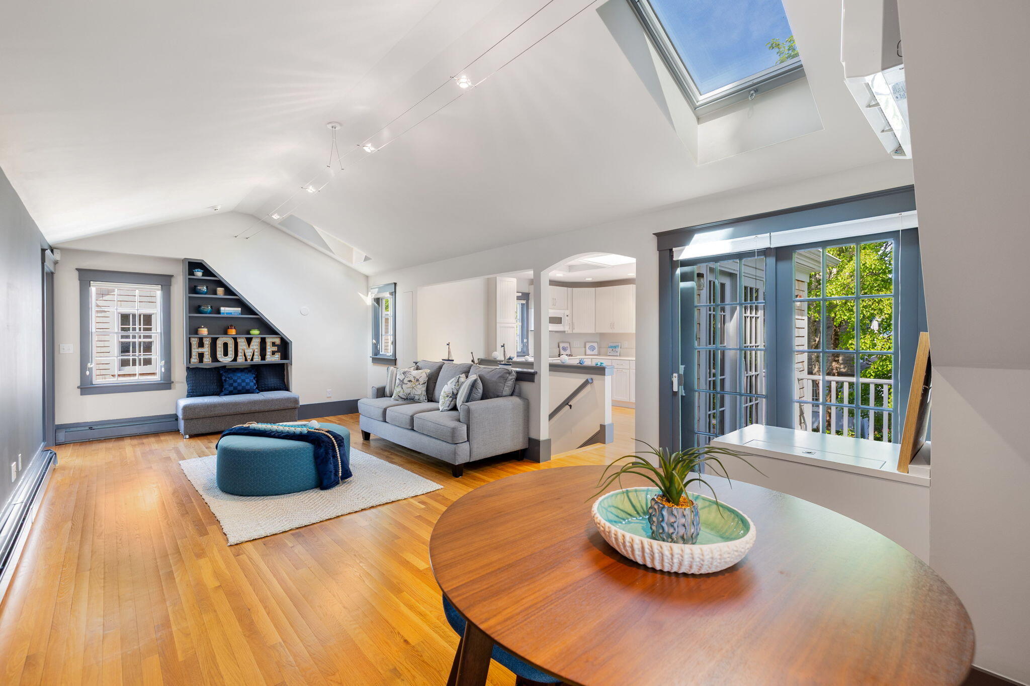 1180 Main Street Cotuit, MA 02635 - Photo 39 of 82 a living room with furniture and a wooden floor