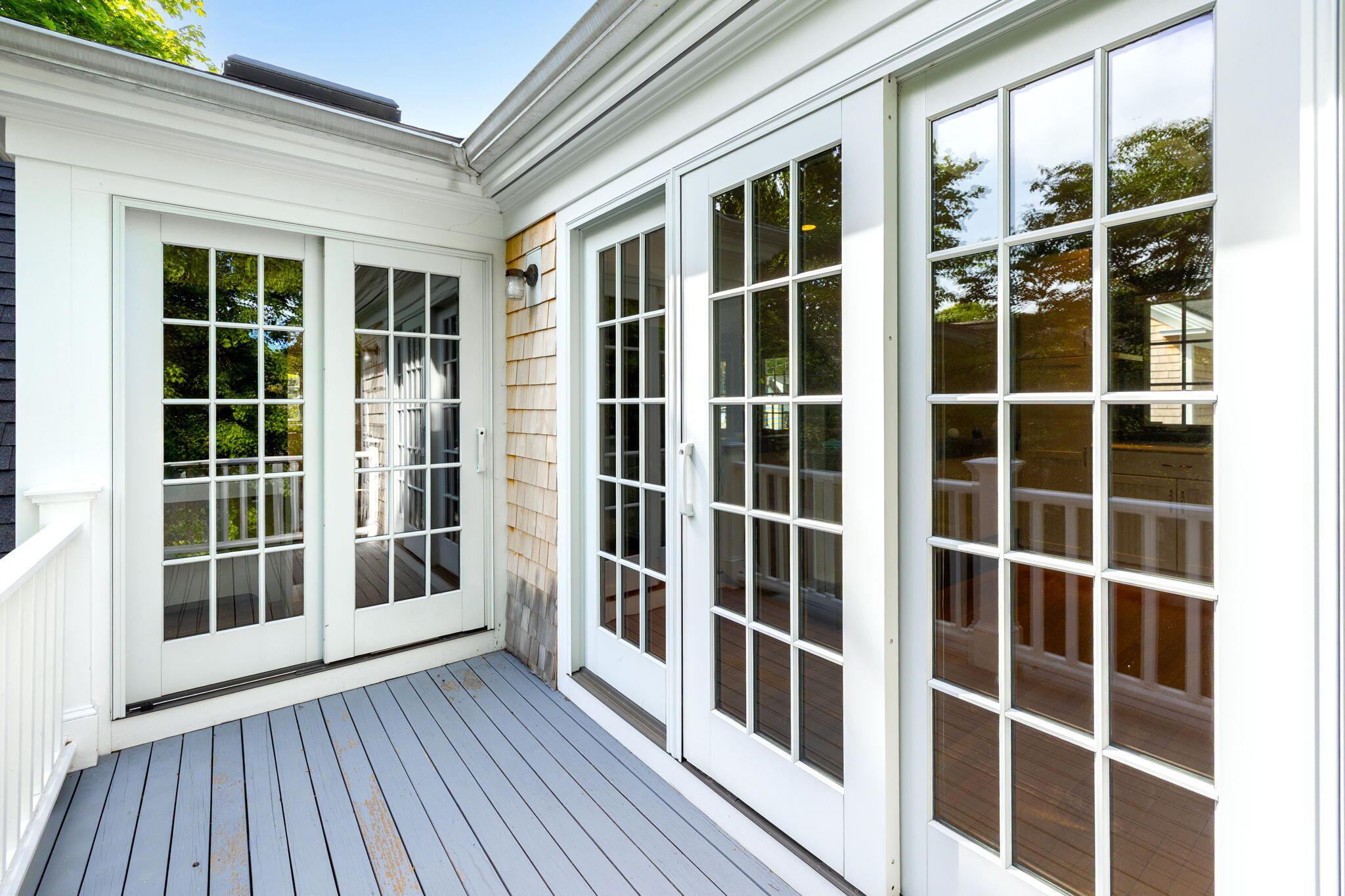 1180 Main Street Cotuit, MA 02635 - Photo 45 of 82 a view of front door with wooden floor and windows